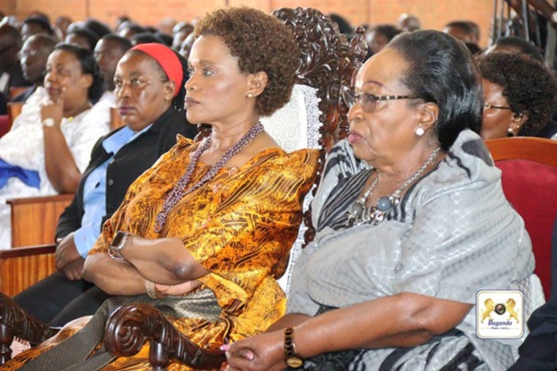 Queen Sylvia Nagginda with Mrs. Joyce Nabosa (right) during the service Image